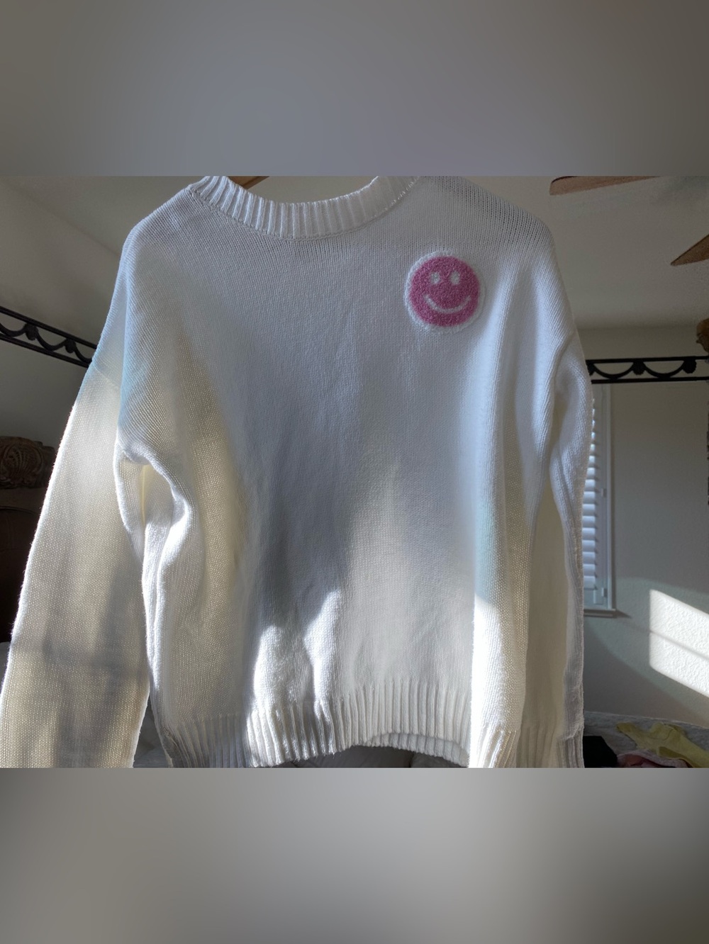 White Sweater with Pink Smiley Patch